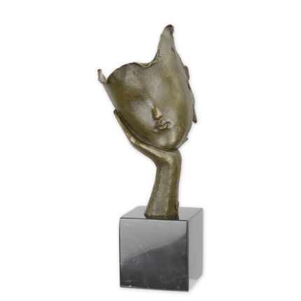 Bronzefigur Gesicht auf einer Hand ruhend, A BRONZE SCULPTURE OF A FACE RESTING ON HAND PALM