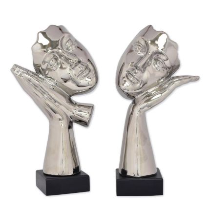 2er-Set Figuren Gesichter auf Hände, Keramik, A PAIR OF CERAMIC FIGURINES AT SLEEP" AND "AWAKE""