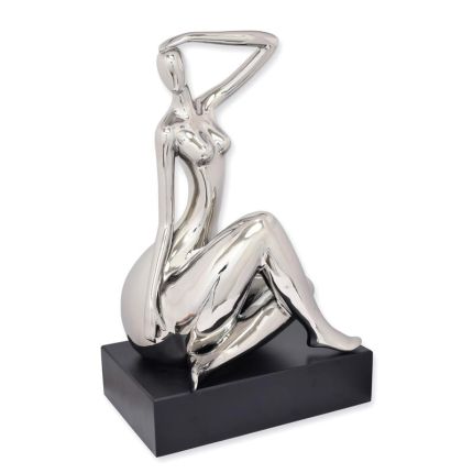 Keramikfigur weiblicher Akt, A CERAMIC FIGURINE OF A RECLINING FEMALE NUDE