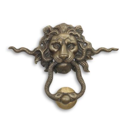 A PAIR OF CAST IRON LION AND SNAKE DOOR KNOCKERS