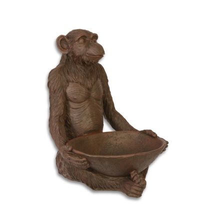 Polyresintierfigur Affe mit Früchteschale, Affenfigur, A RESIN FIGURINE OF A SEATED MONKEY WITH FRUITBOWL