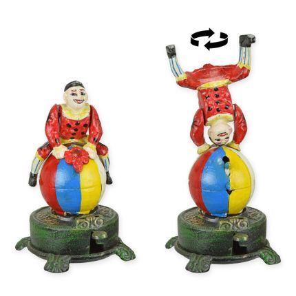 Spardose aus Gusseisen, A CAST IRON CLOWN ON BALL MECHANICAL BANK