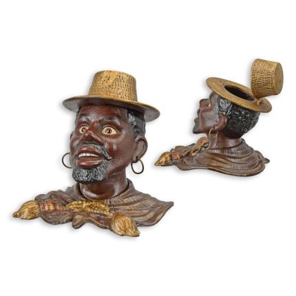 Gusseisenfigur Man mit Strohhut zum Öffnen, A CAST IRON BLACK MAN WITH STRAW HAT INKWELL