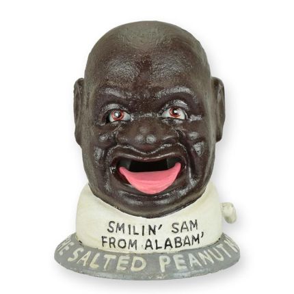 Mechanische Gusseisen-Spardose Männerkopf, A CAST IRON SMILIN' SAM MECHANICAL BANK