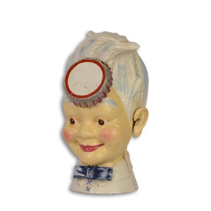 Spardose aus Gusseisen, A CAST IRON BOY HEAD WITH CROWN-CAP BANK