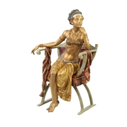 Bronzefigur orientalische Frau, A BRONZE SCULPTURE OF A WOMAN IN A CURULE CHAIR