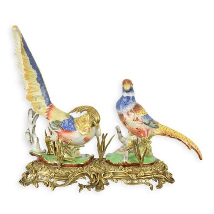 Porzellanfiguren Fasane mit Bronzeanteilen, A BRONZE MOUNTED PORCELAIN GROUP OF PHEASANTS