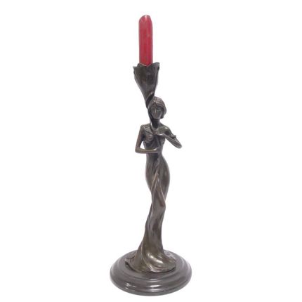 Figürlicher Bronze-Kerzenhalter, A FIGURAL BRONZE CANDLESTICK