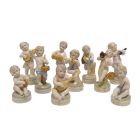 10er-Set Musikantenengelchen, A SET OF 10 PORCELAIN PUTTI MUSICIANS