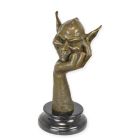 Bronzefigur Koboldkopf auf einer Hand, A BRONZE SCULPTURE OF A GOBLIN HEAD RESTING ON HAND