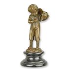 Bronzefigur Junge mit Zigarette, A BRONZE SCULPTURE OF A BOY LIGHTING A CIGARET