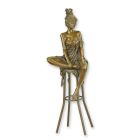 Bronzefigur Frau, A BRONZE SCULPTURE OF A LADY ON BARCHAIR