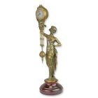 Tischuhr mit Frauenfigur, A TABLE CLOCK MYSTERIEUSE HELT BY A WOMAN