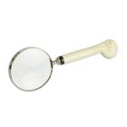 Lupe mit Schädelgriff, A MAGNIFYING-GLASS WITH SKULL HANDLE