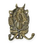 Gusseisen-Wandhaken mit Pferdkopf, A CAST IRON HORSEHEAD COAT HOOK