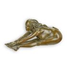 Bronzefigur weiblicher Akt, A BRONZE SCULPTURE OF A STRETCHING NUDE