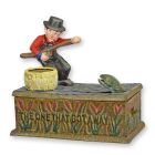 Mehrfarbige Gusseisen-Spardose Fischer, mechanisch, A CAST IRON FISHERMAN MECHANICAL BANK