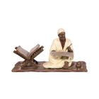 Bronzefigur Schreiber, A BRONZE SCULPTURE OF A KORAN SCRIBE