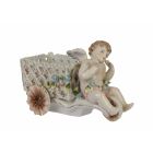 Porzellanfigur Putte mit Wagen, A PORCELAIN CHERUB CART