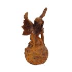 Gusseisenfigur Fee, Elfe, rostfarben, A RUSTY CAST IRON FIGURINE OF A FAIRY ON BALL