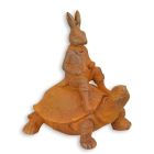 Gusseisenfigur Hase mit Schildkröte, Höhe 19,5 cm, Hasenfigur, Hasenfigurine, Schildkrötenfigur, Schildkrötenfigurine, Gusseisenhase, Gusseisenschildkröte, Gusseisentier, Tierfigur, Gartenfigur, A RUSTY CAST IRON FIGURINE OF A BUNNY RIDING A TURTLE