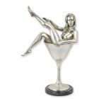 Bronzefigur nackte Frau in einem Cocktailglas, A BRONZE SCULPTURE OF A WOMAN IN A COCKTAIL GLASS