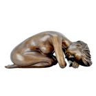 Bronzefigur weiblicher Akt, A BRONZE SCULPTURE OF A RECLINING FEMALE NUDE