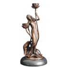 Figürlicher Bronze-Kerzenhalter, A BRONZE ART NOUVEAU CANDLEHOLDER