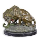 Bronzetierfigur Löwe mit Schlange, A BRONZE SCULPTURE OF A LION AND SERPENT