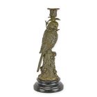 Kerzenständer aus Bronze mit Papageienfigur, Dekofigur, A BRONZE PARROT CANDLE HOLDER